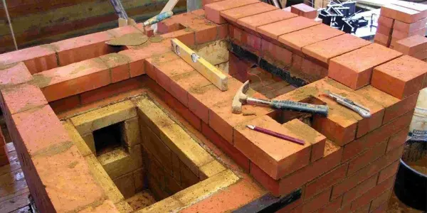 Кирпичная кладка дымохода и особенности монтажа