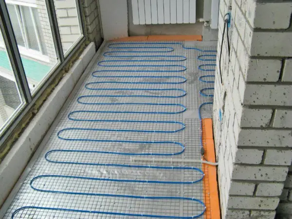 Underfloor heating system for a loggia or balcony Underfloor heating system for a loggia or balcony