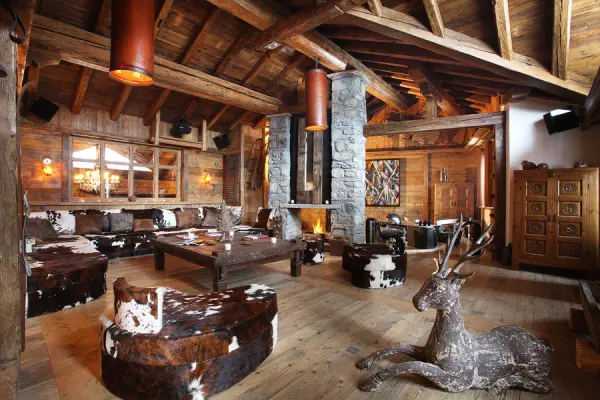 What are the pros and cons of chalet houses?