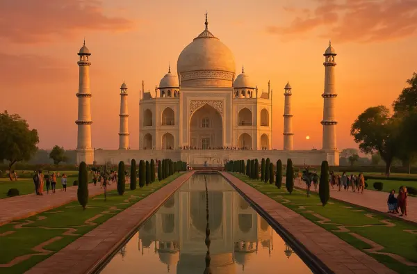 panoramic view of the Taj Mahal against the background of sunrise/sunset with reflection in the water surface