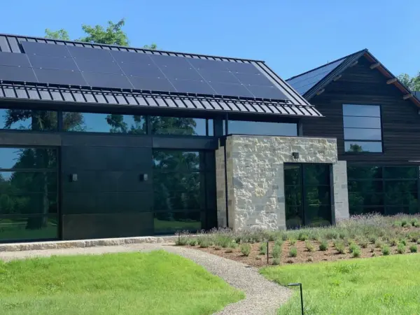 Integrated solar systems on metal roofing